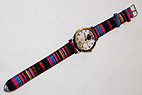PugSpeak Pug Watch 4 - Pug Watch 4 - Pug Watch 4 comes with a multi-colored canvas type striped band and fob featuring a sweet, fawn Pug. 