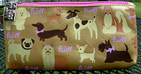 Pug and Pet Cosmetic Bag 5 is from Fluff Poochy series - a variety of toy breeds including a pug on a metallic gold with hot pink lining, zippered closure, and a detachable strap. Measures 5.00" X 8.00" (12.7 X 20.32 cm).