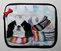 Japanese Chin iPad Sleeve measures 9.75" X 7.50" (24.765 X 19.05 cm). Silver metallic front with black Neoprene back, and adorable Japanese Chin wrapped in a scarf. Faux fur lining and zippered closure.