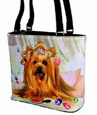 Yorkie Purse 1 is a Microfiber Yorkie bucket handbag features a darling Yorkie with a pink boudoir background. Measures 10.50" X 9.50" (26.67 X 24.13 cm).