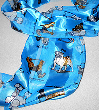 Pug and Pet Scarf 2 -This long scarf comes in deep, tropical blue and features many breeds including Pugs, Chows, Afghan Hounds, Bichons, Poodles, and Boxers. Measuring 58' long X 13" wide (147.32 X 33.02 cm).