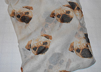 Pug Scarf 9 - This scarf is white and features fawn Pugs and measures a generous 70" X 36" (177.8 CM X 91.44 CM) and can double as a shawl.