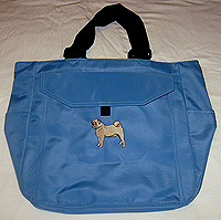 Pug Tote B in blue Pug Tote B in sky blue is made with sturdy Microfiber fabric and is large enough to carry a laptop. This pug tote bag also features adjustable shoulder straps, two inner zippered compartments,a zippered closure, two water bottle compartments, an interior cell phone compartment, and numerous pockets for pens, etc. Fawn embroidered pug. 