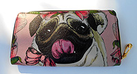 Pug Wallet 8. Happy Pug on pink background with faux leather zip-around with zippered coin as a divider and five card slots. Measures 7.50 inches by 4.50 inches or 19.05 cm by 11.43 cm